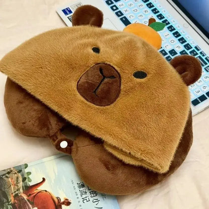 Travel pillow with capybara hood