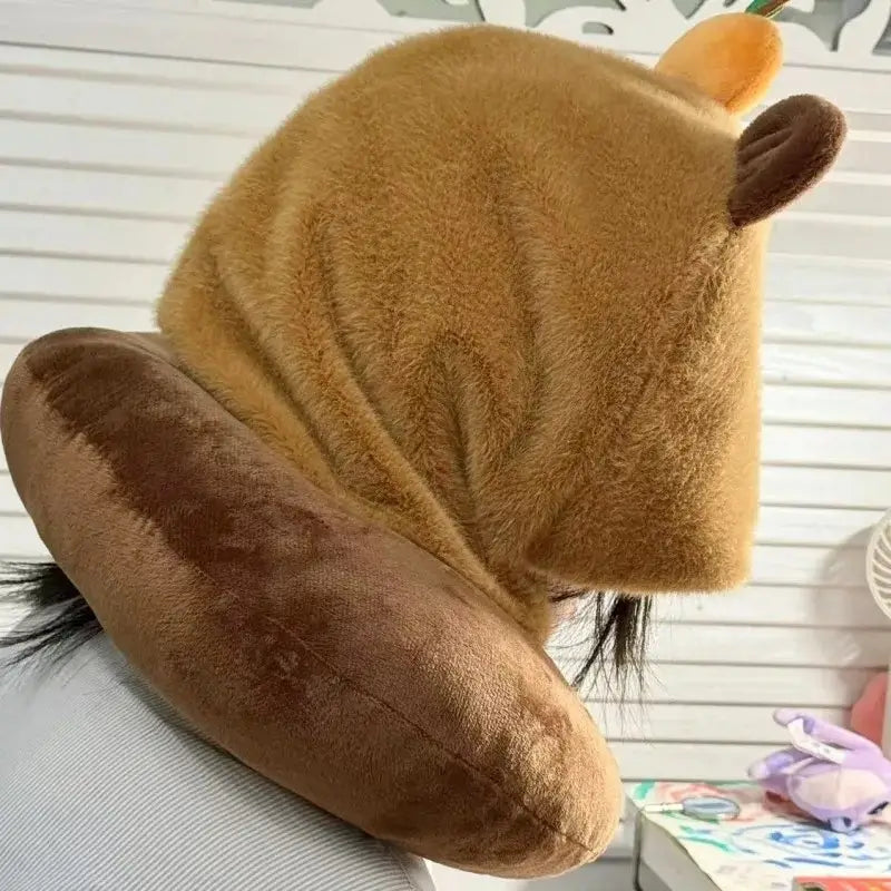 Travel pillow with capybara hood