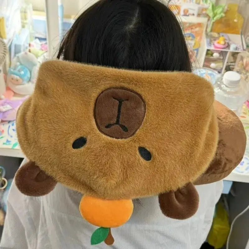 Travel pillow with capybara hood