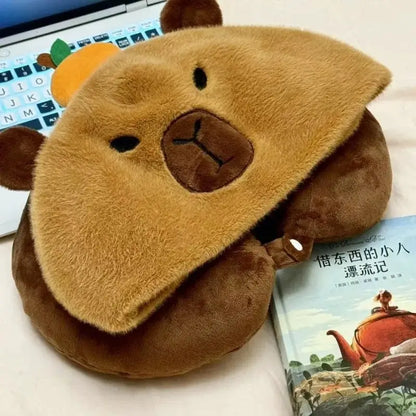 Travel pillow with capybara hood