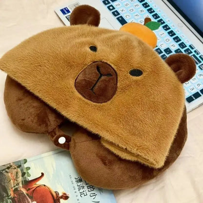 Travel pillow with capybara hood